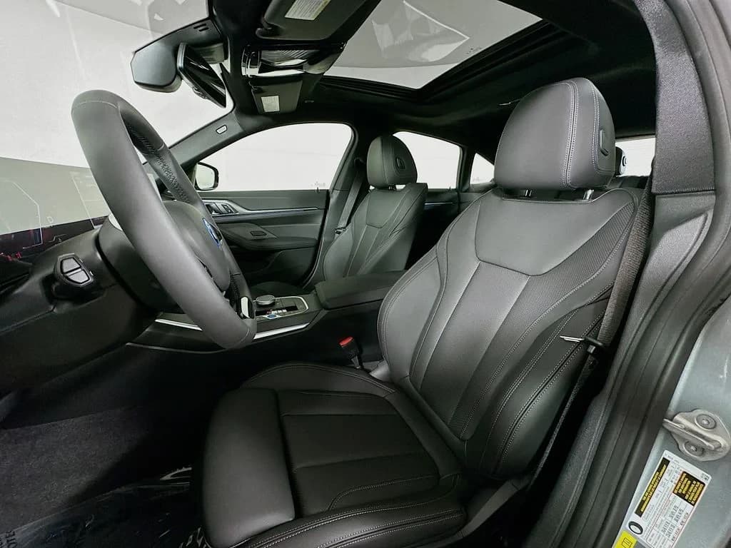 BMW i4 xDrive40 Gran Coupe 2026 — side view