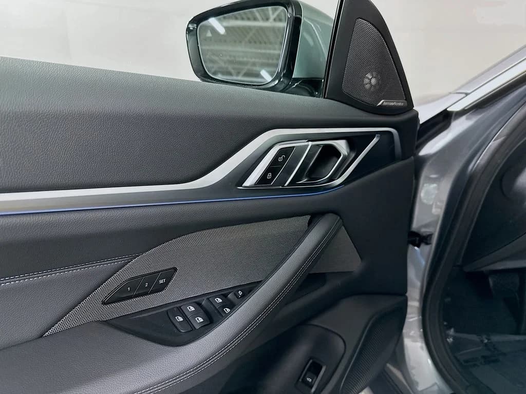 BMW i4 xDrive40 Gran Coupe 2026 — side view