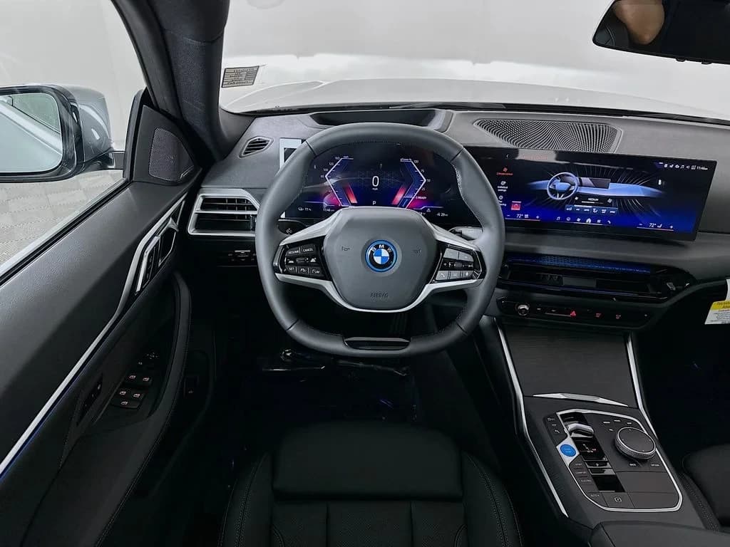 BMW i4 xDrive40 Gran Coupe 2026 — side view