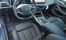 BMW i4 xDrive40 Gran Coupe 2026 — side view