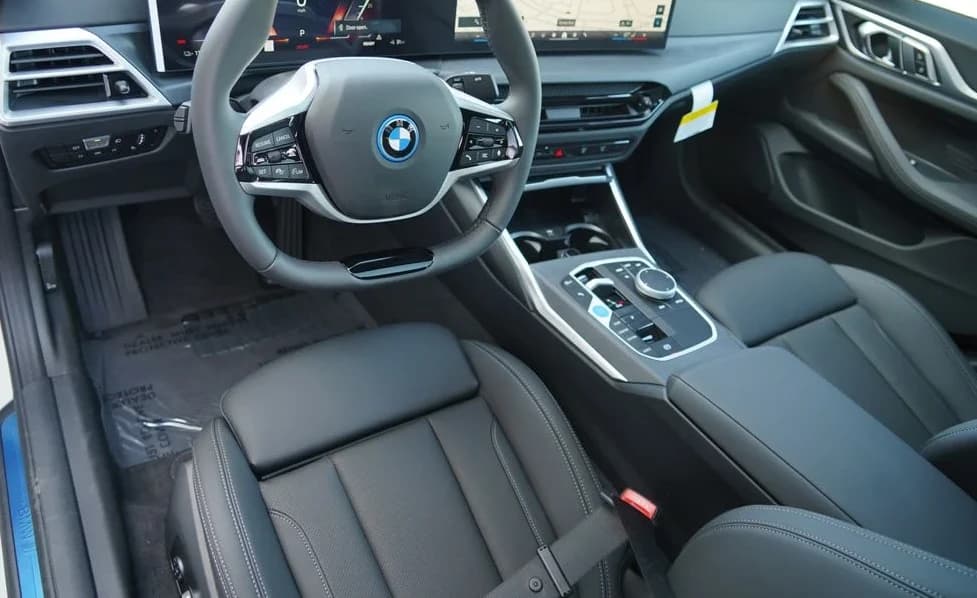 BMW i4 xDrive40 Gran Coupe 2026 — side view