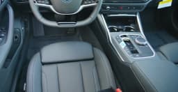 BMW i4 xDrive40 Gran Coupe 2026 — side view