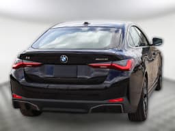 BMW i4 eDrive40 Gran Coupe 2026 — side view