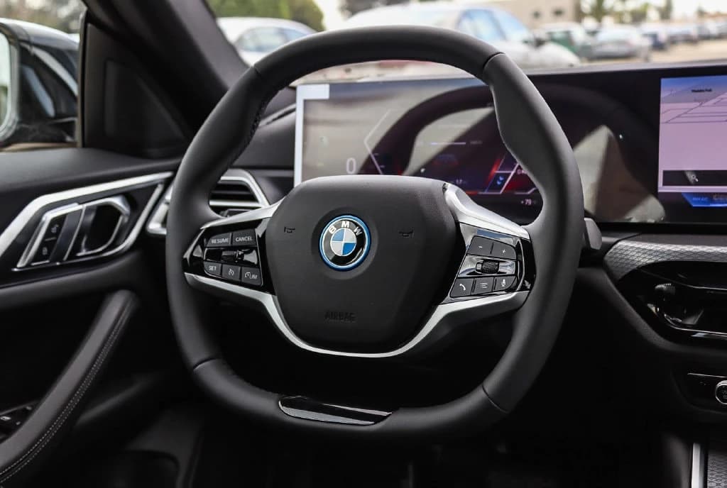 BMW i4 eDrive40 Gran Coupe 2026 — side view
