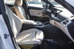 BMW i4 eDrive40 Gran Coupe 2026 — side view