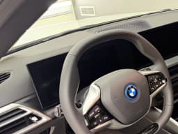 BMW i4 eDrive40 Gran Coupe 2026 — side view