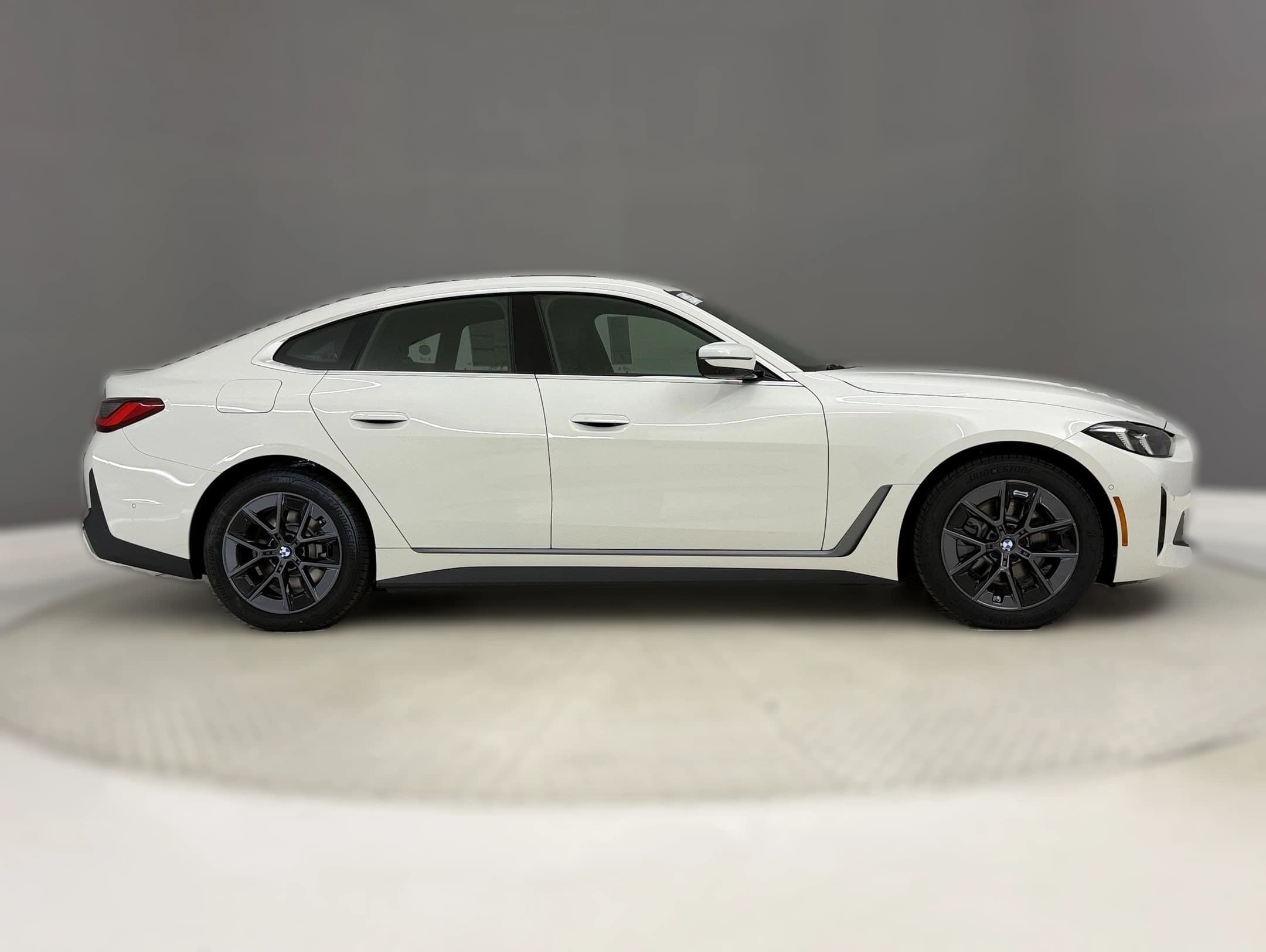 BMW i4 eDrive40 Gran Coupe 2026 — side view