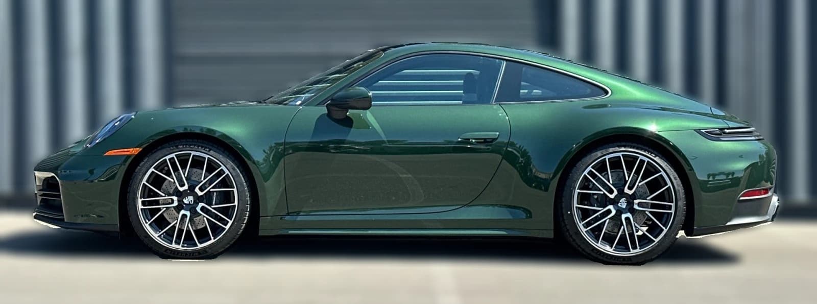 Porsche 911 Carrera Coupe 2026 — side view