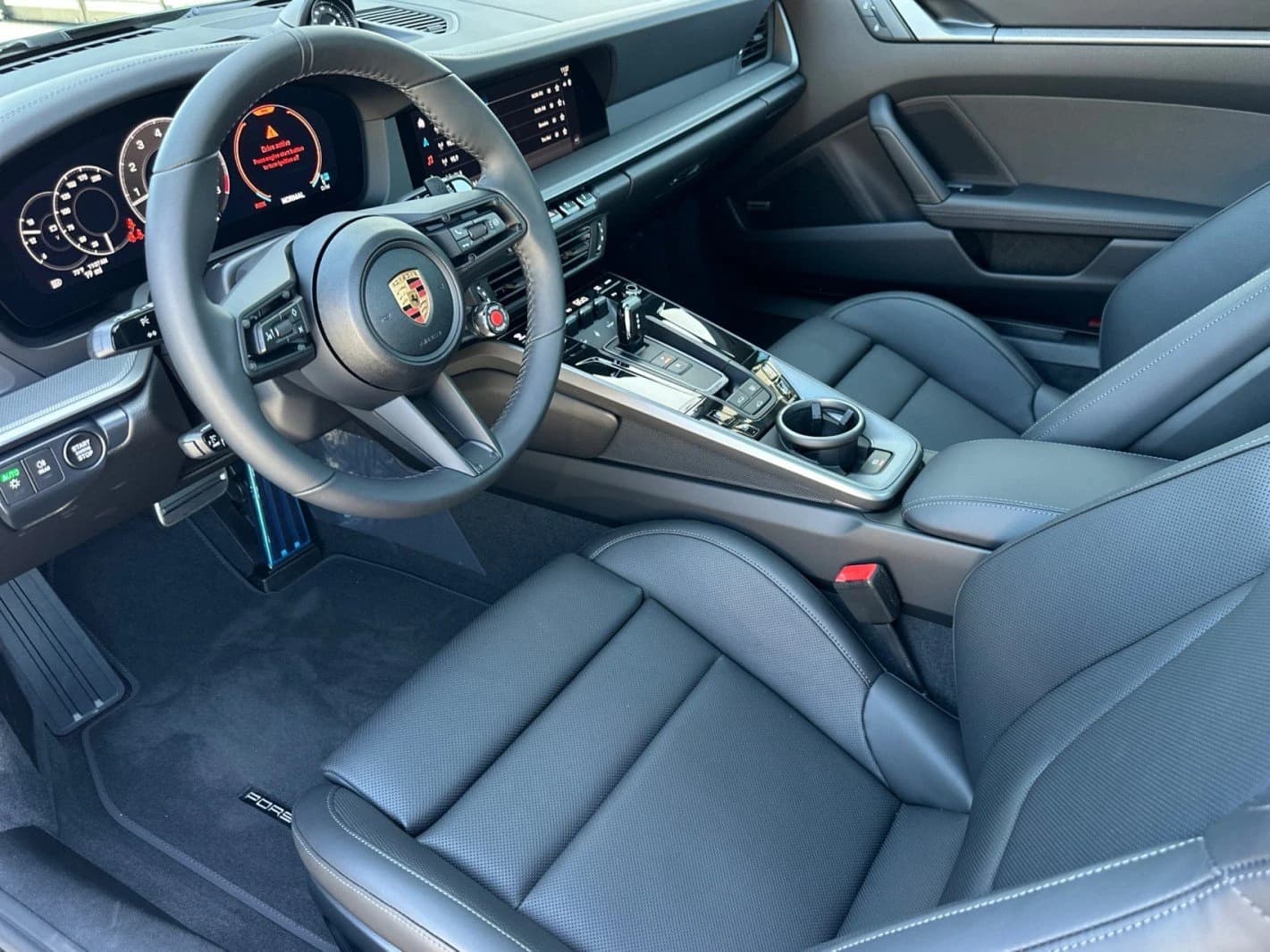 Porsche 911 Carrera Coupe 2026 — side view