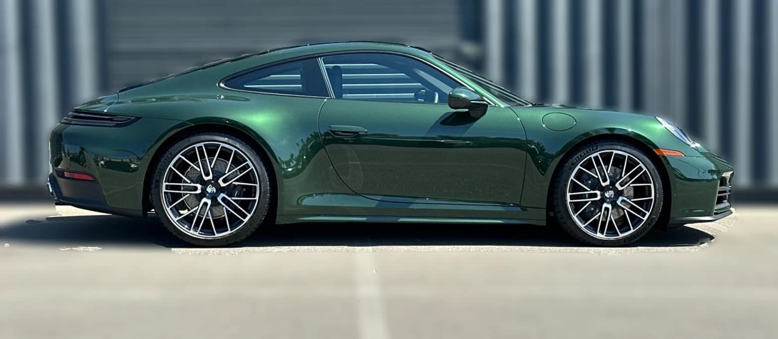Porsche 911 Carrera Coupe 2026 — side view