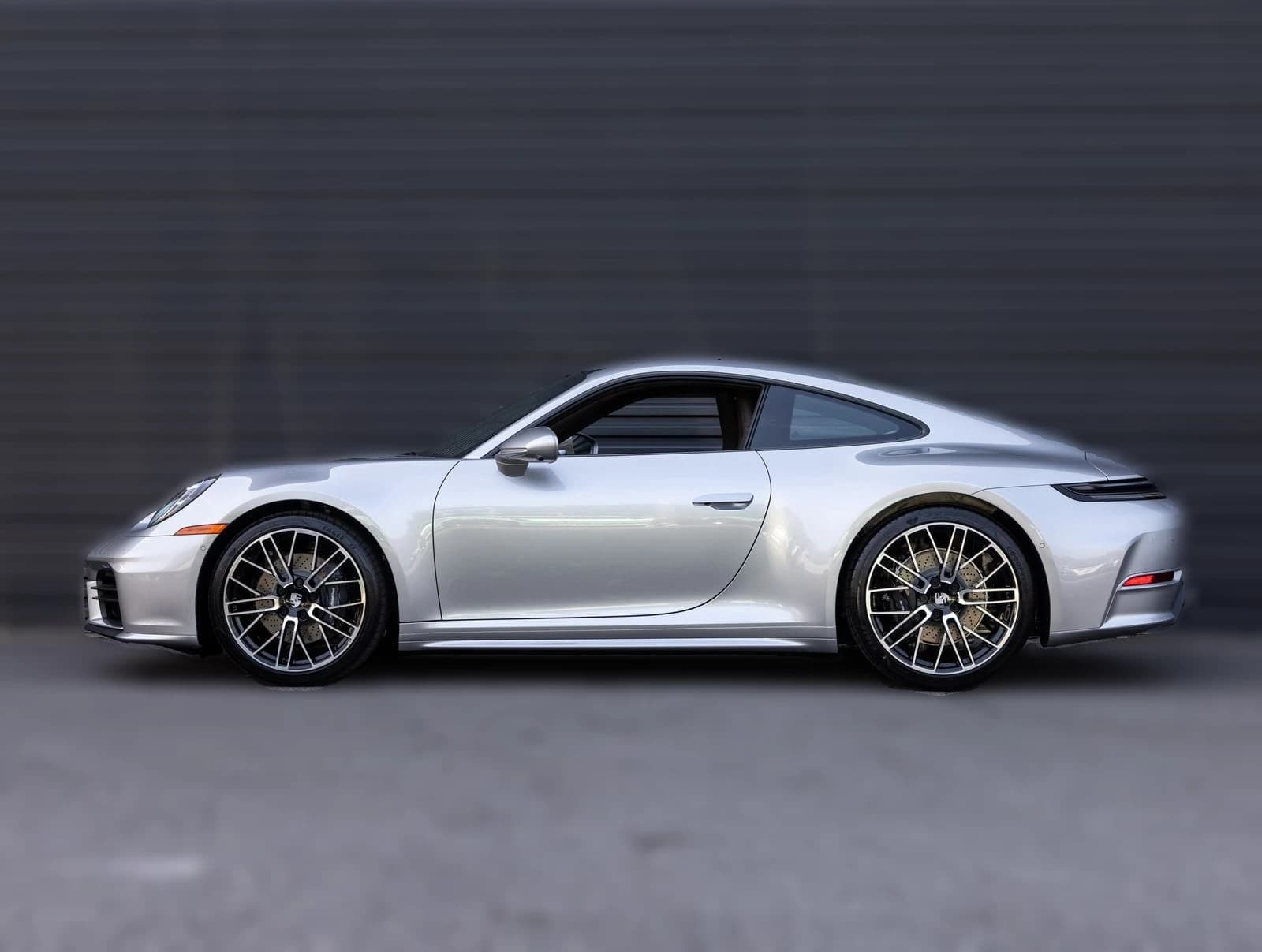 Porsche 911 Carrera Coupe 2026 — side view