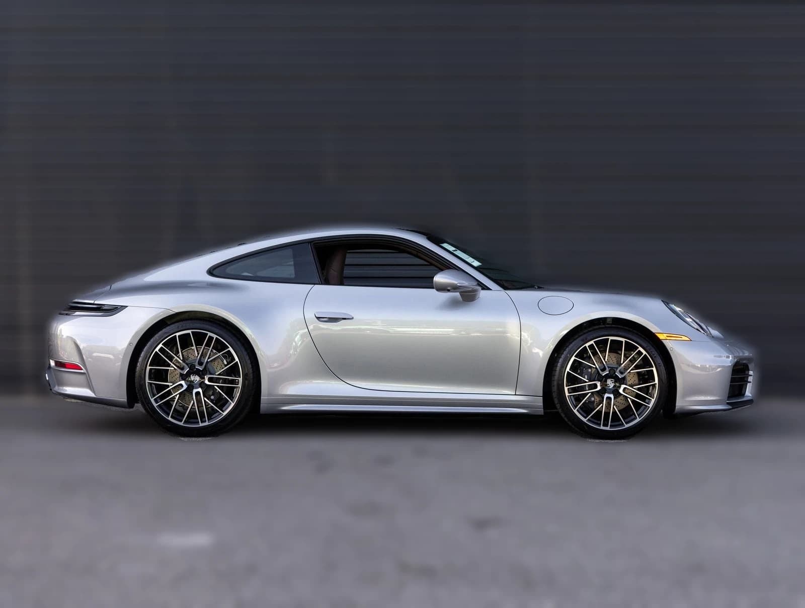 Porsche 911 Carrera Coupe 2026 — side view