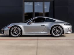 Porsche 911 Carrera Coupe 2026 — side view