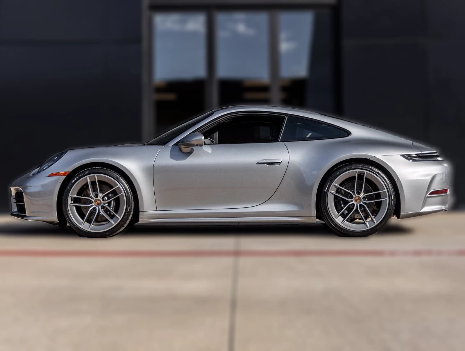 Porsche 911 Carrera Coupe 2026 — side view