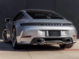 Porsche 911 Carrera Coupe 2026 — side view