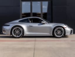 Porsche 911 Carrera Coupe 2026 — side view