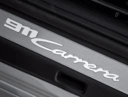 Porsche 911 Carrera Coupe 2026 — side view