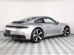 Porsche 911 Carrera Coupe 2026 — side view