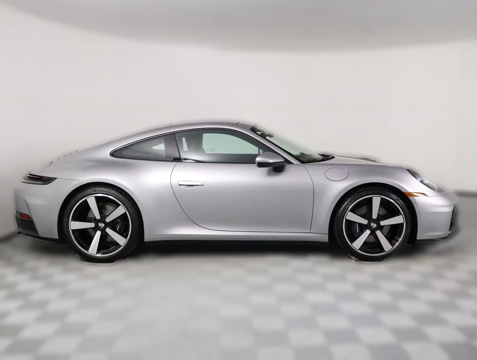 Porsche 911 Carrera Coupe 2026 — side view