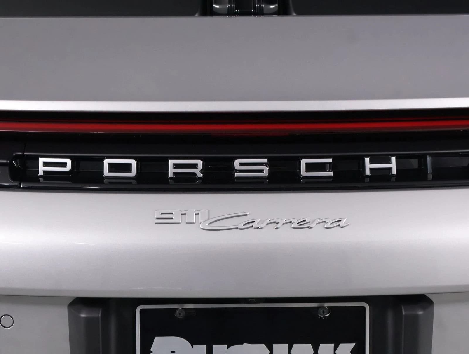 Porsche 911 Carrera Coupe 2026 — side view