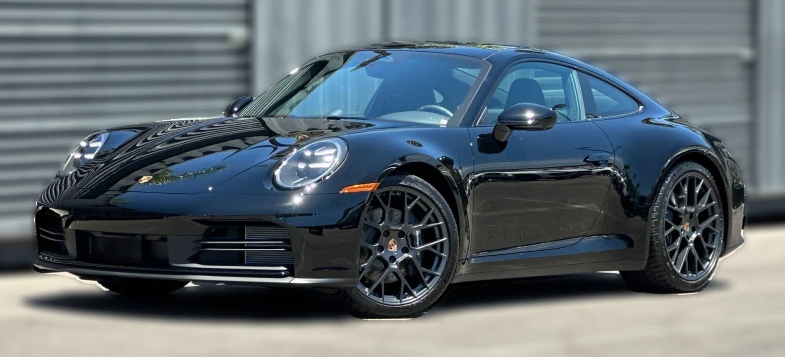 Porsche 911 Carrera Coupe 2026 — side view