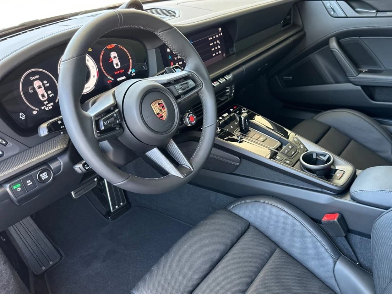 Porsche 911 Carrera Coupe 2026 — side view