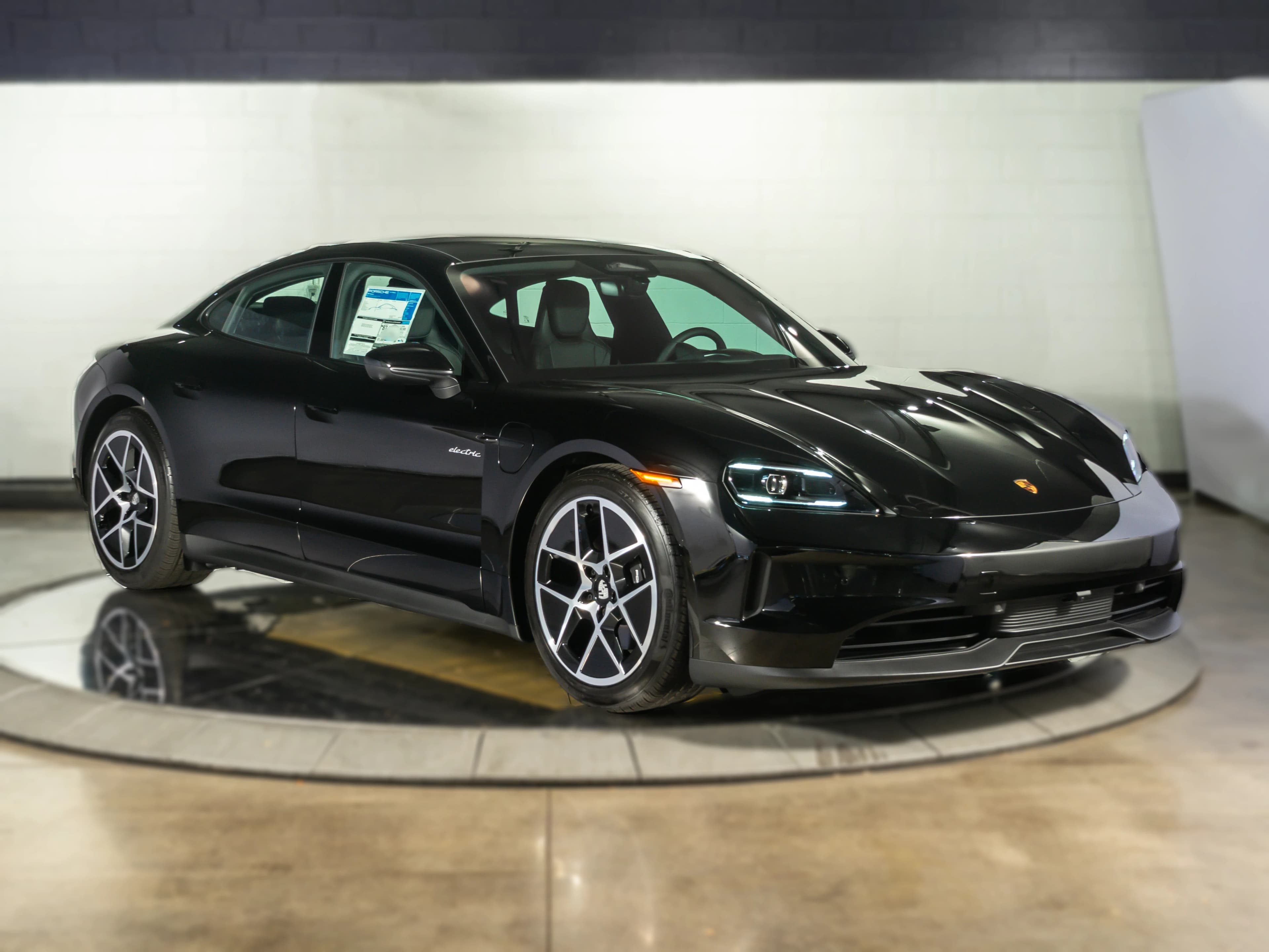 Porsche Taycan 4 AWD 2026 — side view