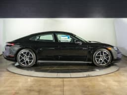Porsche Taycan 4 AWD 2026 — side view