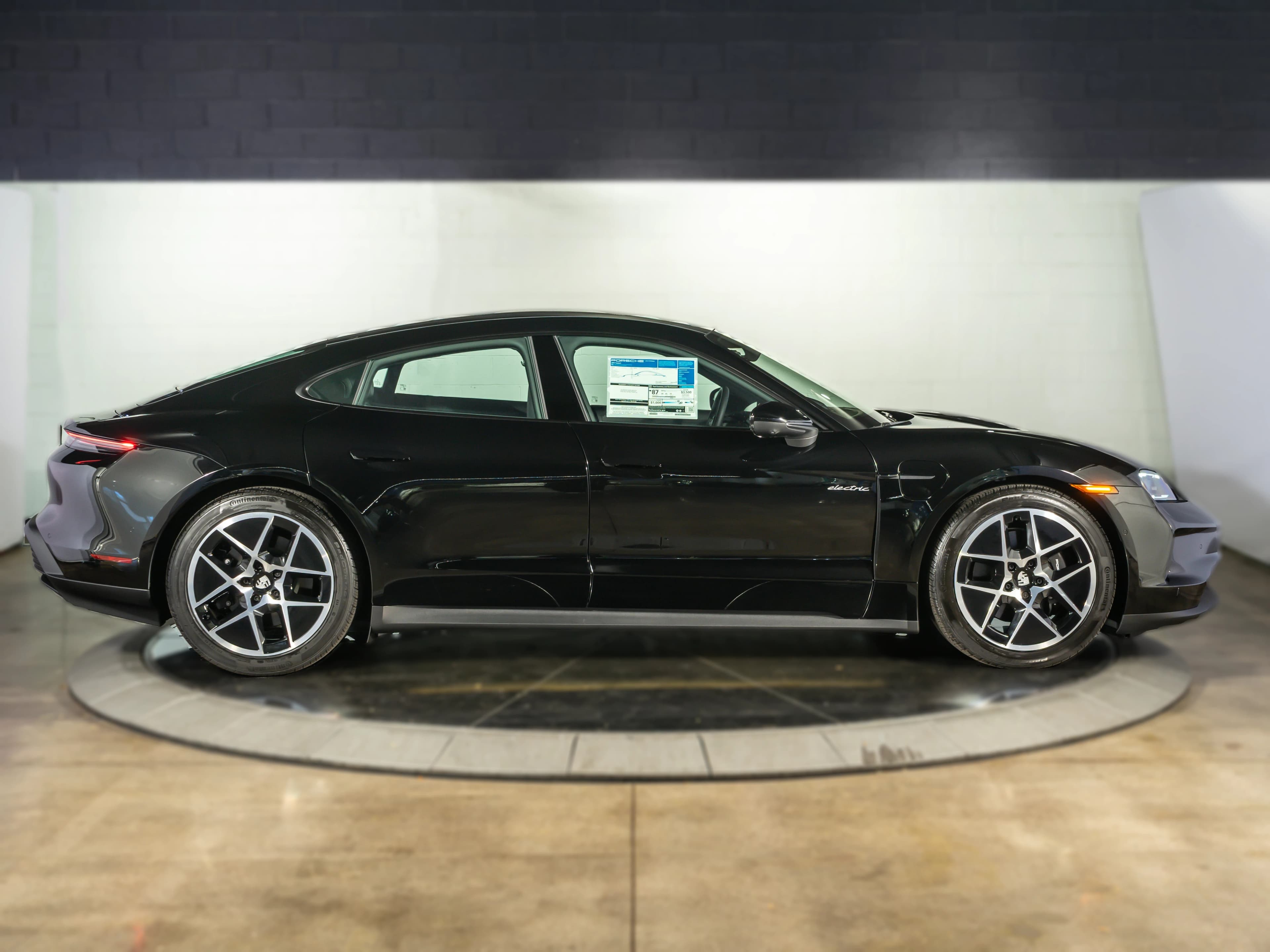 Porsche Taycan 4 AWD 2026 — side view