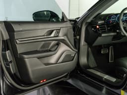 Porsche Taycan 4 AWD 2026 — side view