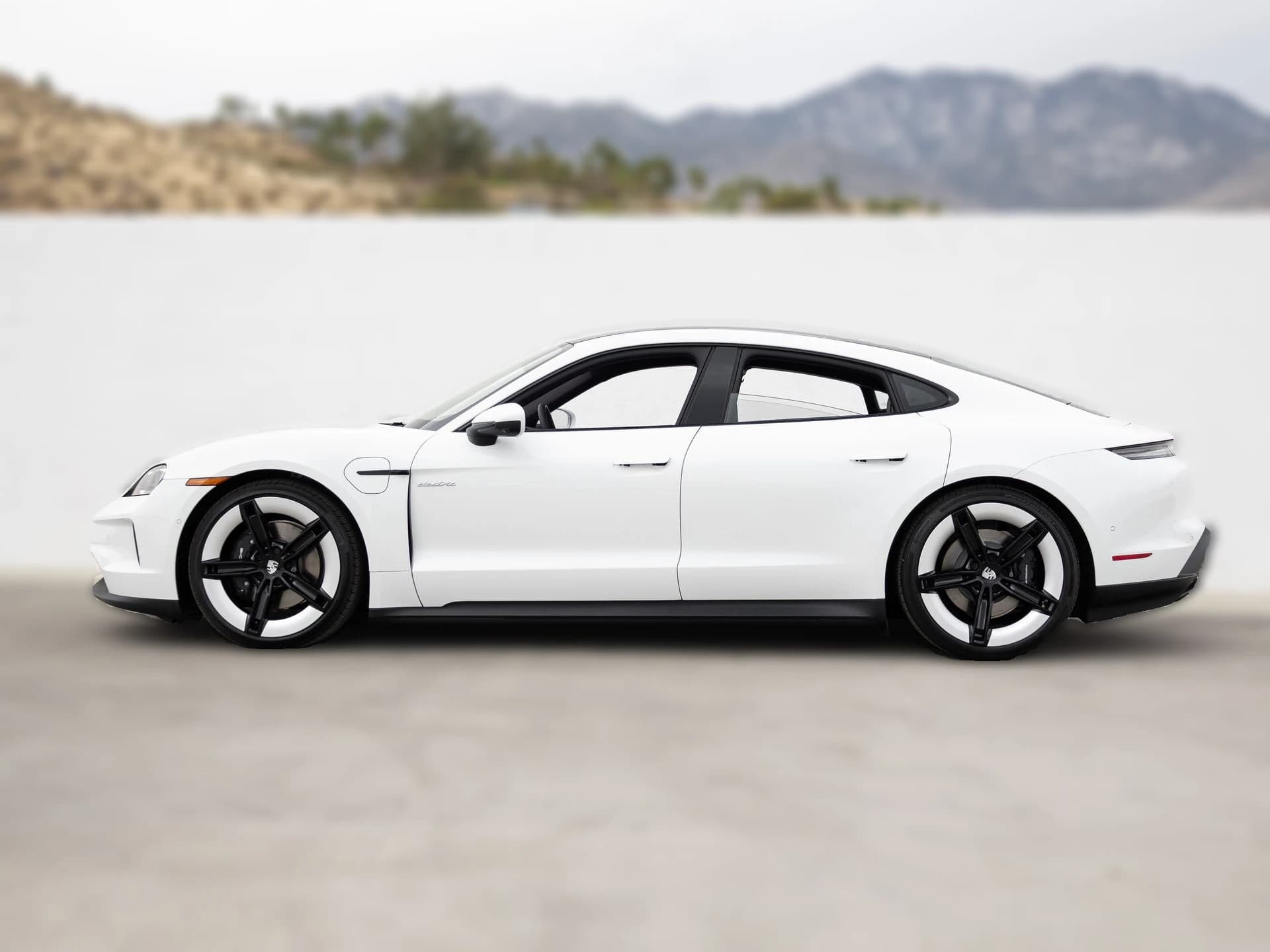 Porsche Taycan 4 AWD 2026 — side view