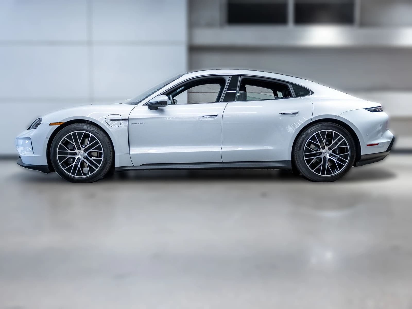 Porsche Taycan 4 AWD 2026 — side view