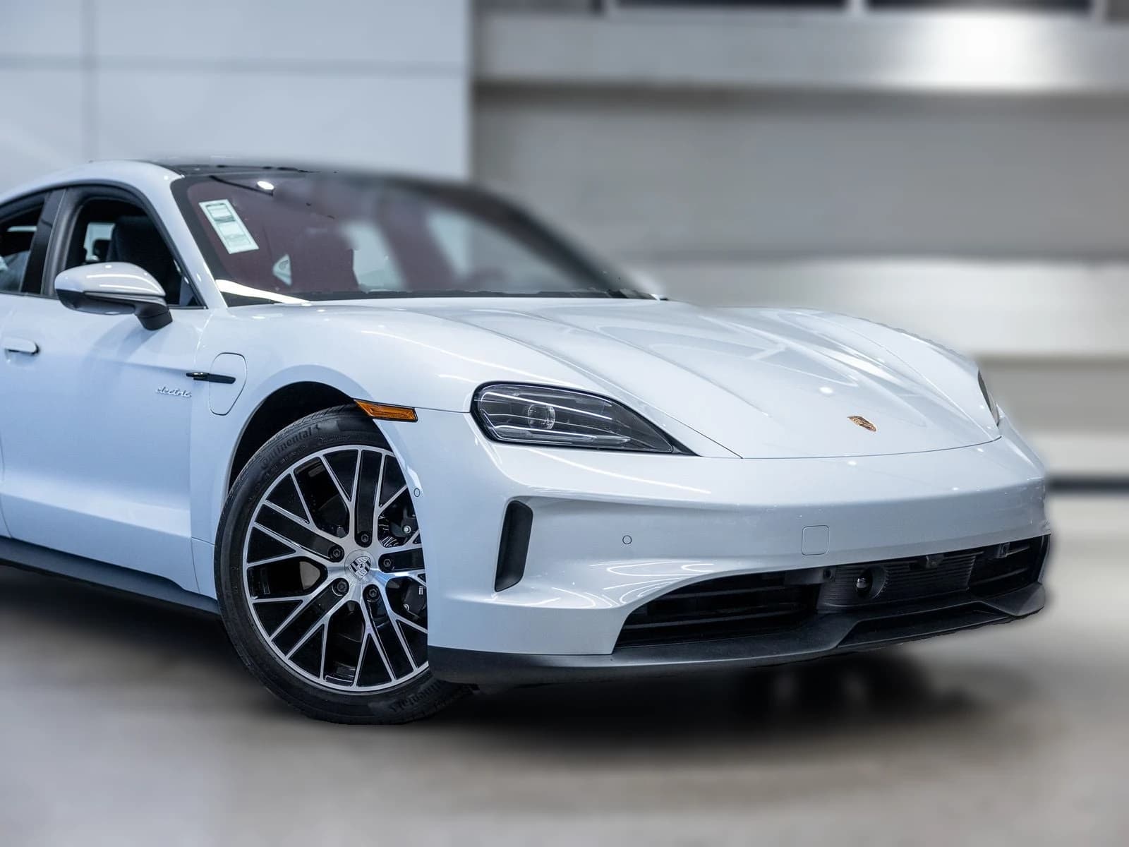 Porsche Taycan 4 AWD 2026 — side view