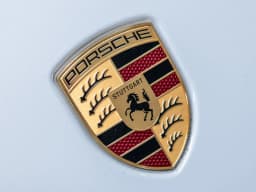 Porsche Taycan 4 AWD 2026 — side view