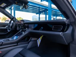 Porsche Taycan 4 AWD 2026 — side view