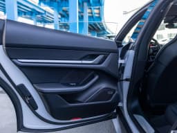 Porsche Taycan 4 AWD 2026 — side view