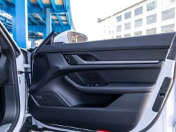Porsche Taycan 4 AWD 2026 — side view