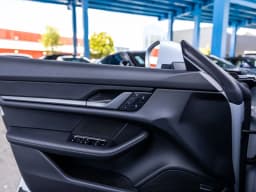 Porsche Taycan 4 AWD 2026 — side view
