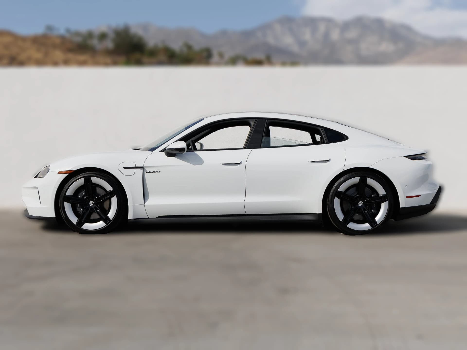 Porsche Taycan 4 AWD 2026 — side view