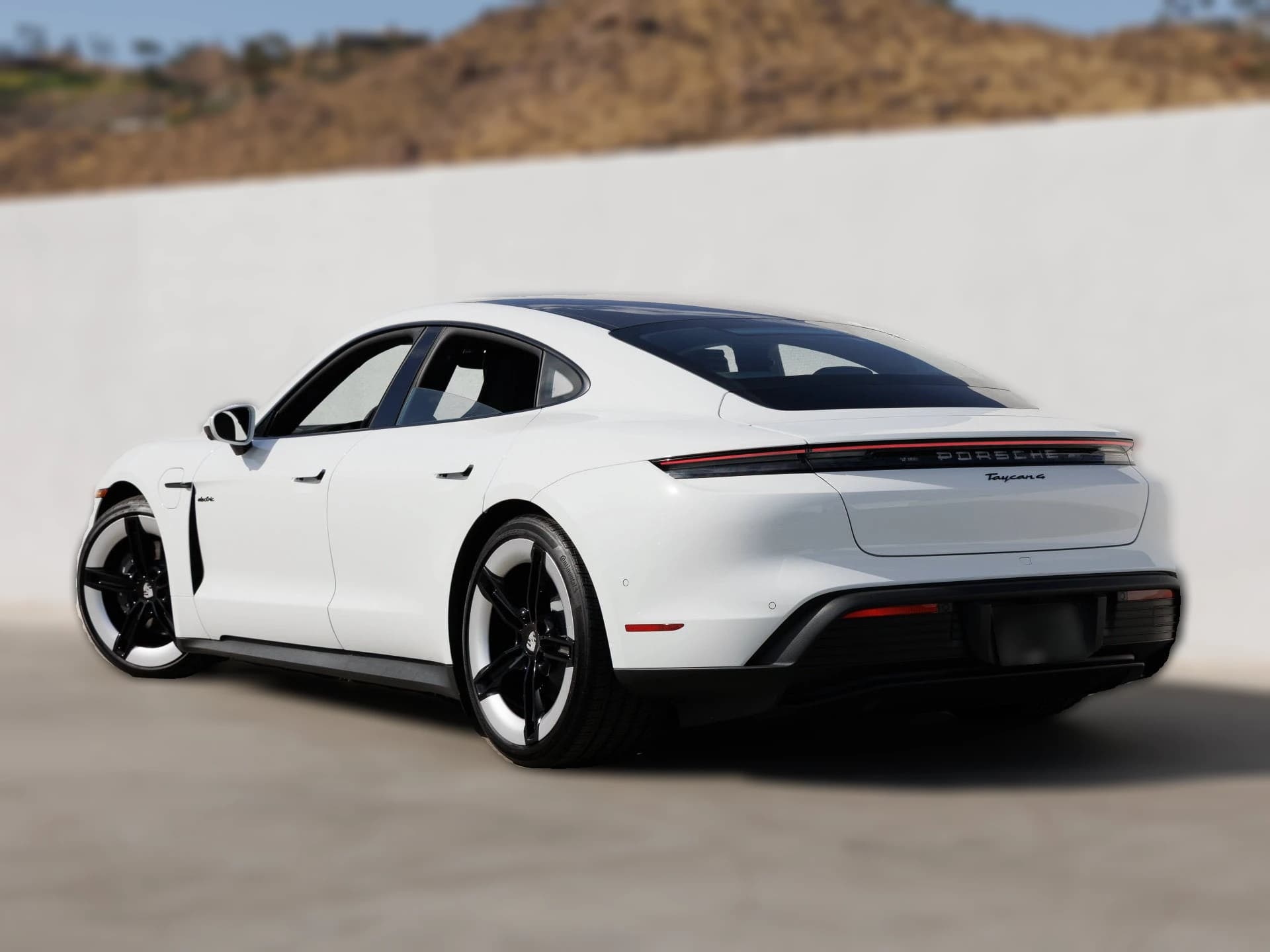 Porsche Taycan 4 AWD 2026 — side view