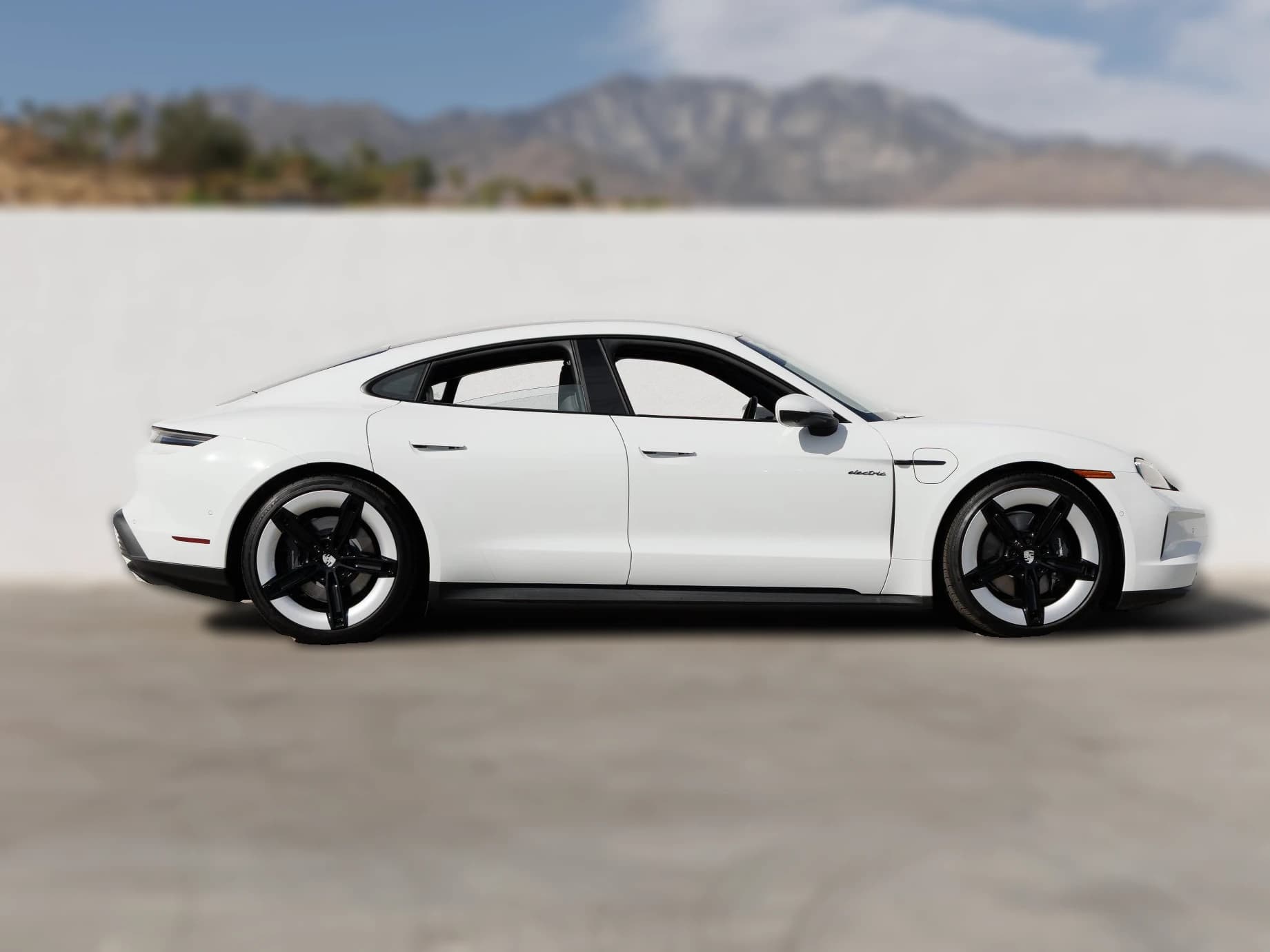 Porsche Taycan 4 AWD 2026 — side view