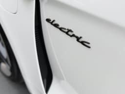 Porsche Taycan 4 AWD 2026 — side view
