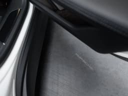 Porsche Taycan 4 AWD 2026 — side view