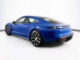 Porsche Taycan 4 AWD 2025 — side view