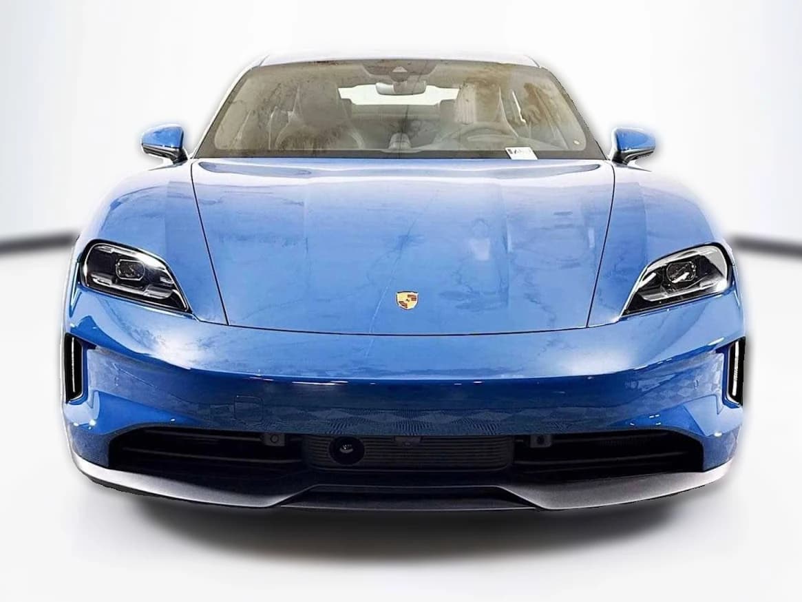 Porsche Taycan 4 AWD 2025 — side view