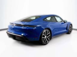 Porsche Taycan 4 AWD 2025 — side view