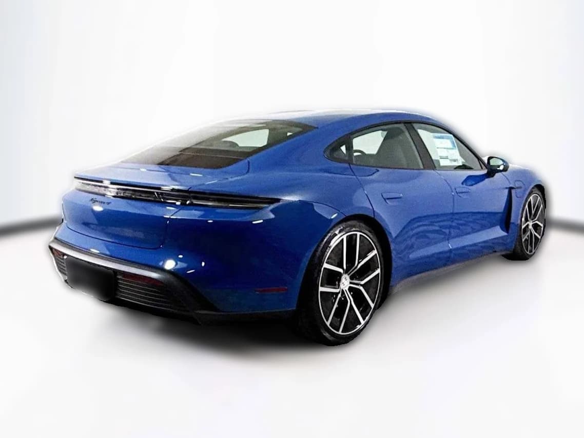 Porsche Taycan 4 AWD 2025 — side view