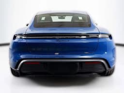 Porsche Taycan 4 AWD 2025 — side view