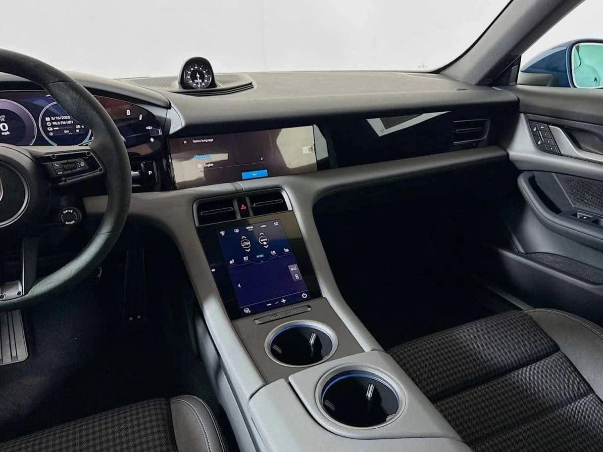 Porsche Taycan 4 AWD 2025 — side view