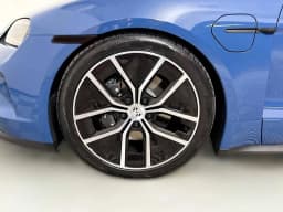 Porsche Taycan 4 AWD 2025 — side view